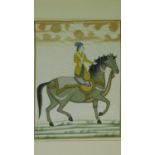 A 20th century framed and glazed Persian silk painting of a rider on horseback. 65x53cm