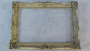 A Rococo style gesso picture frame. 77x110cm