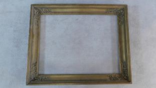 A 19th century giltwood and gesso picture frame. 110x133cm