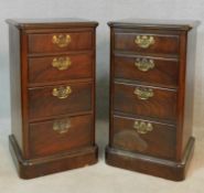 A pair of 19th century walnut chests of four graduating drawers on plinth bases. H.77 W.44 D.36cm