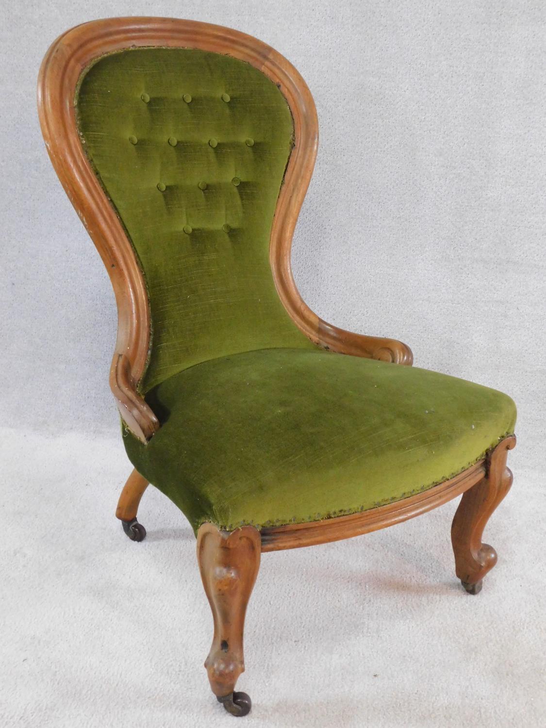 A Victorian mahogany framed spoon backed nursing chair in buttoned upholstery on carved cabriole - Image 2 of 5
