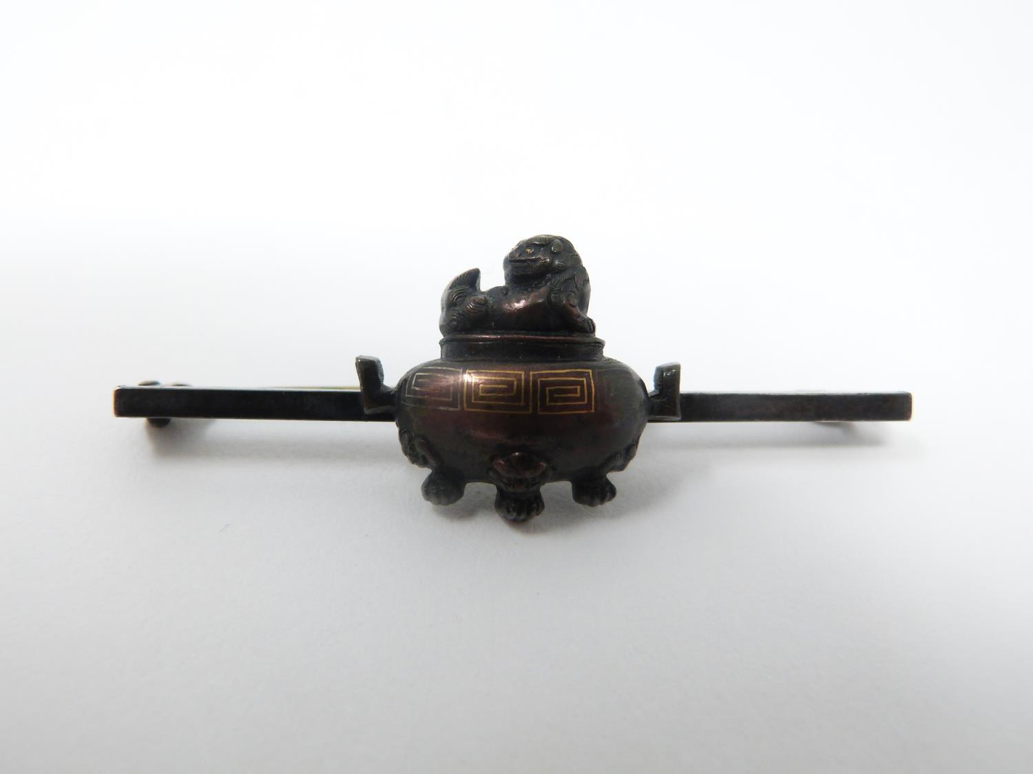 An antique bronze bar brooch with a mounted miniature two handled bronze censer with Buddhistic lion - Image 4 of 8