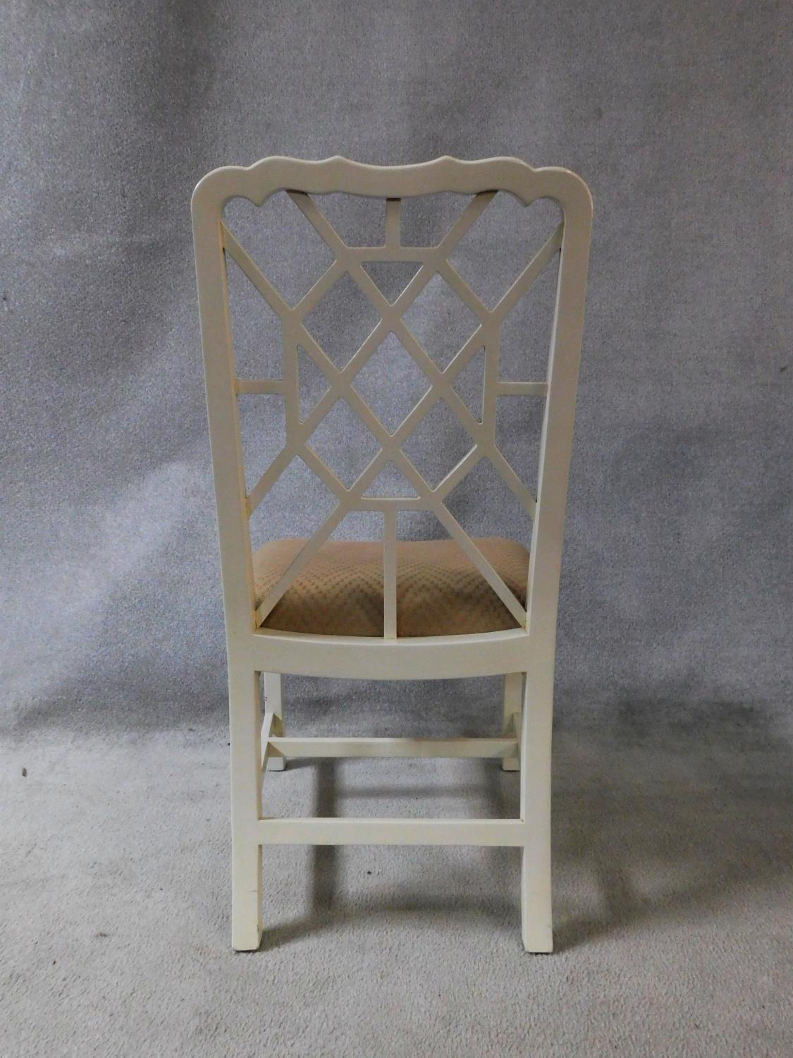A set of eight white painted Chinese Chippendale style dining chairs with beige upholstered - Image 8 of 8