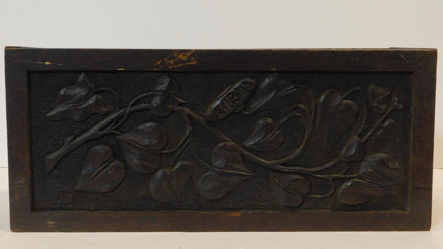 A late 19th century oak stationery casket with Arts and Crafts style floral carved panels. H.22 W.50 - Image 5 of 8