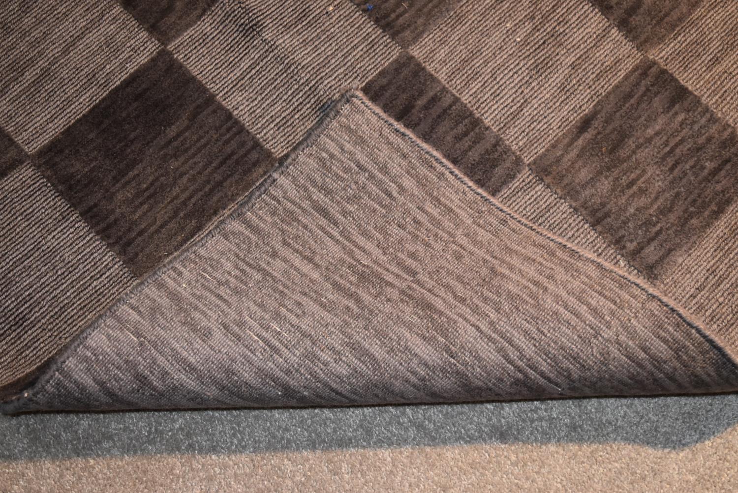 A contemporary rug with grey chequerboard pattern. L.144x94cm - Image 4 of 4