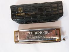 A Vintage Chromonica 260 harmonica by German maker Hohner, a 10 hole chromatic harmonica, the little