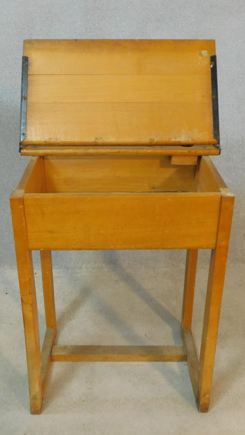A vintage beech school desk with hinged lid revealing book compartment. H.80 W.62 D.42cm - Image 4 of 5