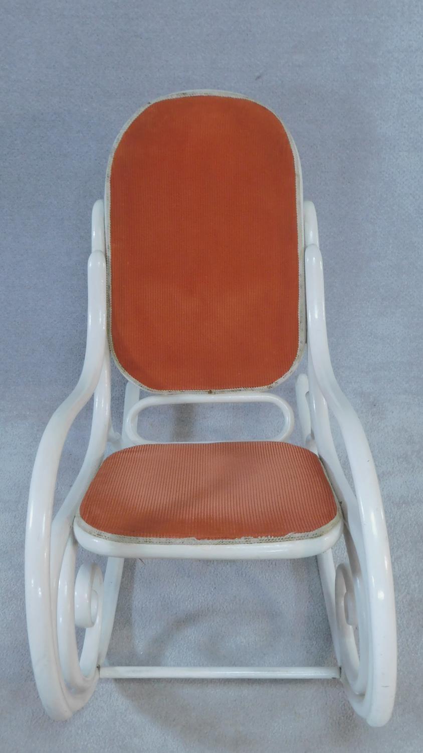 A vintage white framed bentwood rocking armchair. H.92 W.51 D.102cm