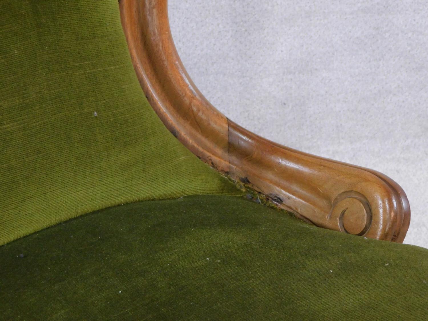 A Victorian mahogany framed spoon backed nursing chair in buttoned upholstery on carved cabriole - Image 5 of 5