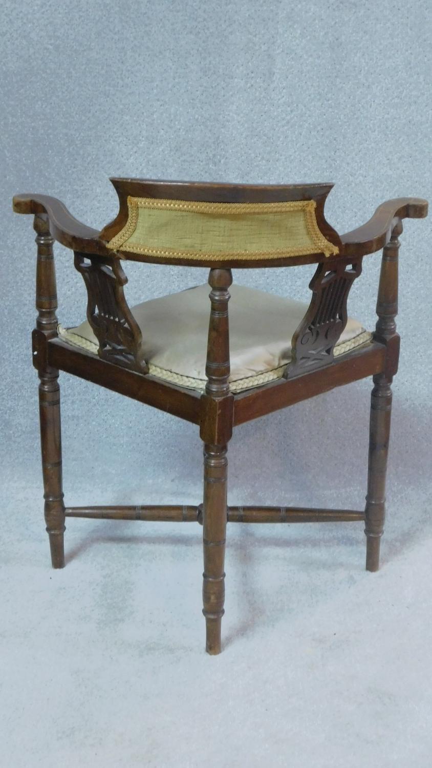 An Edwardian mahogany corner chair with lyre carved splats on turned stretchered supports. H.72cm - Image 6 of 7