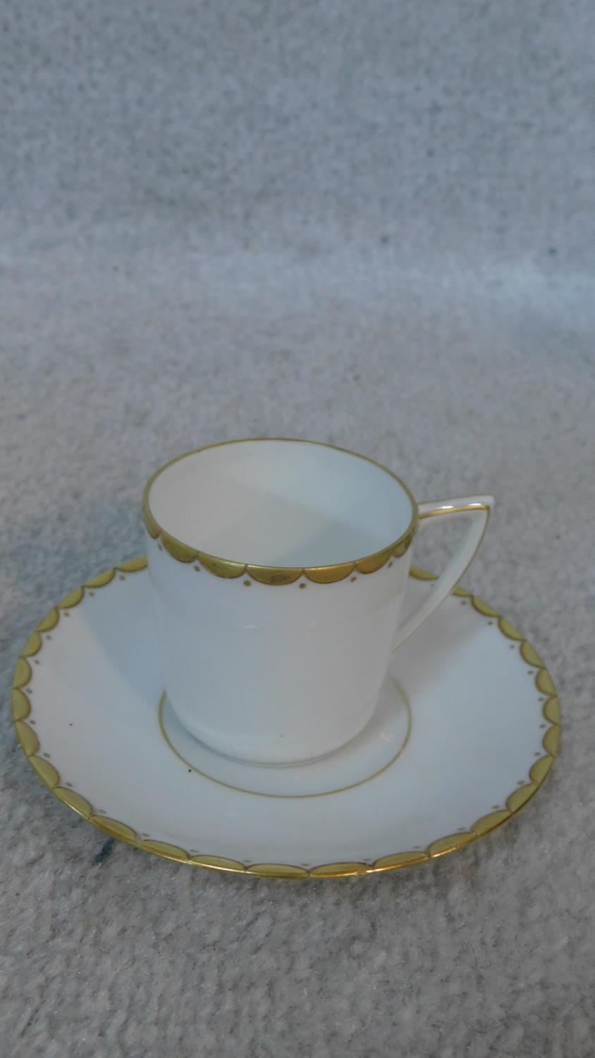An extensive dinner service in white porcelain and gilt highlighted rims, marked Epiag, - Image 2 of 10