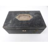 An antique silk lined leather effect jewellery box with a collection of antique and vintage