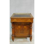 A late Victorian burr walnut Aesthetic style Davenport with satinwood floral Arabesque inlay and