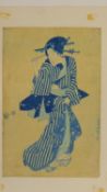 A Japanese wood block print of a lady in traditional clothing. Artsits gourd shaped seal mark 34x23.