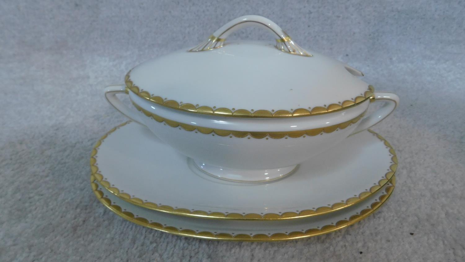 An extensive dinner service in white porcelain and gilt highlighted rims, marked Epiag, - Image 3 of 10