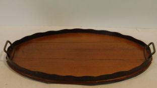 A late 19th century mahogany galleried tray with twin brass carrying handles. 57x37cm