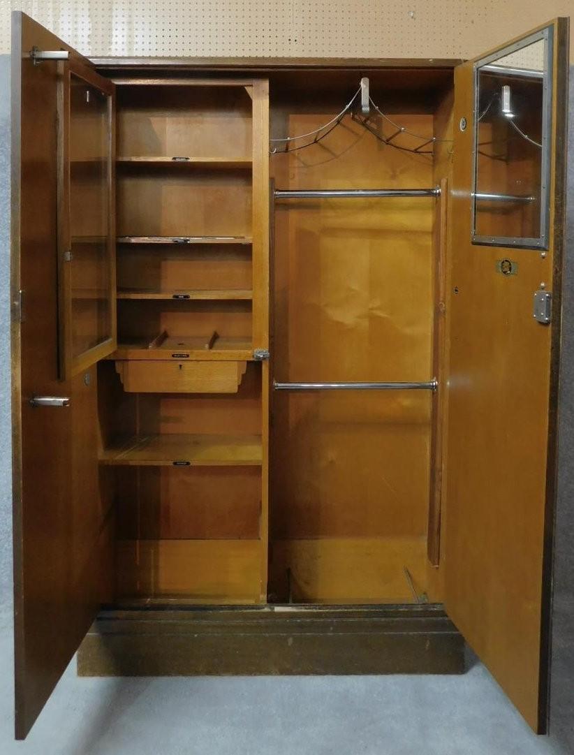 A vintage fitted oak gentleman's wardrobe with slides, drawers and hanging space, patented by - Image 3 of 9