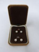 Two pairs of pearl earrings. One pair of cultured pearl earrings on 15ct gold posts, one with 9ct