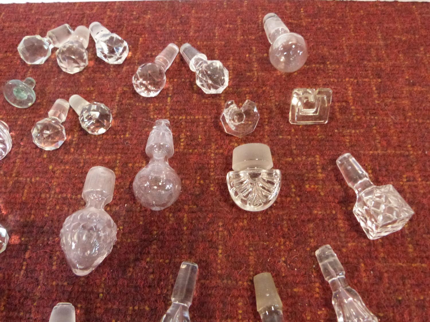 A miscellaneous collection of twenty nine cut crystal and other decanter and scent bottle - Image 3 of 4