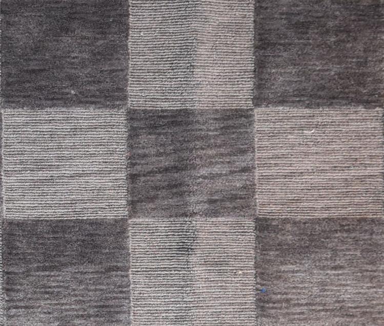 A contemporary rug with grey chequerboard pattern. L.144x94cm - Image 2 of 4