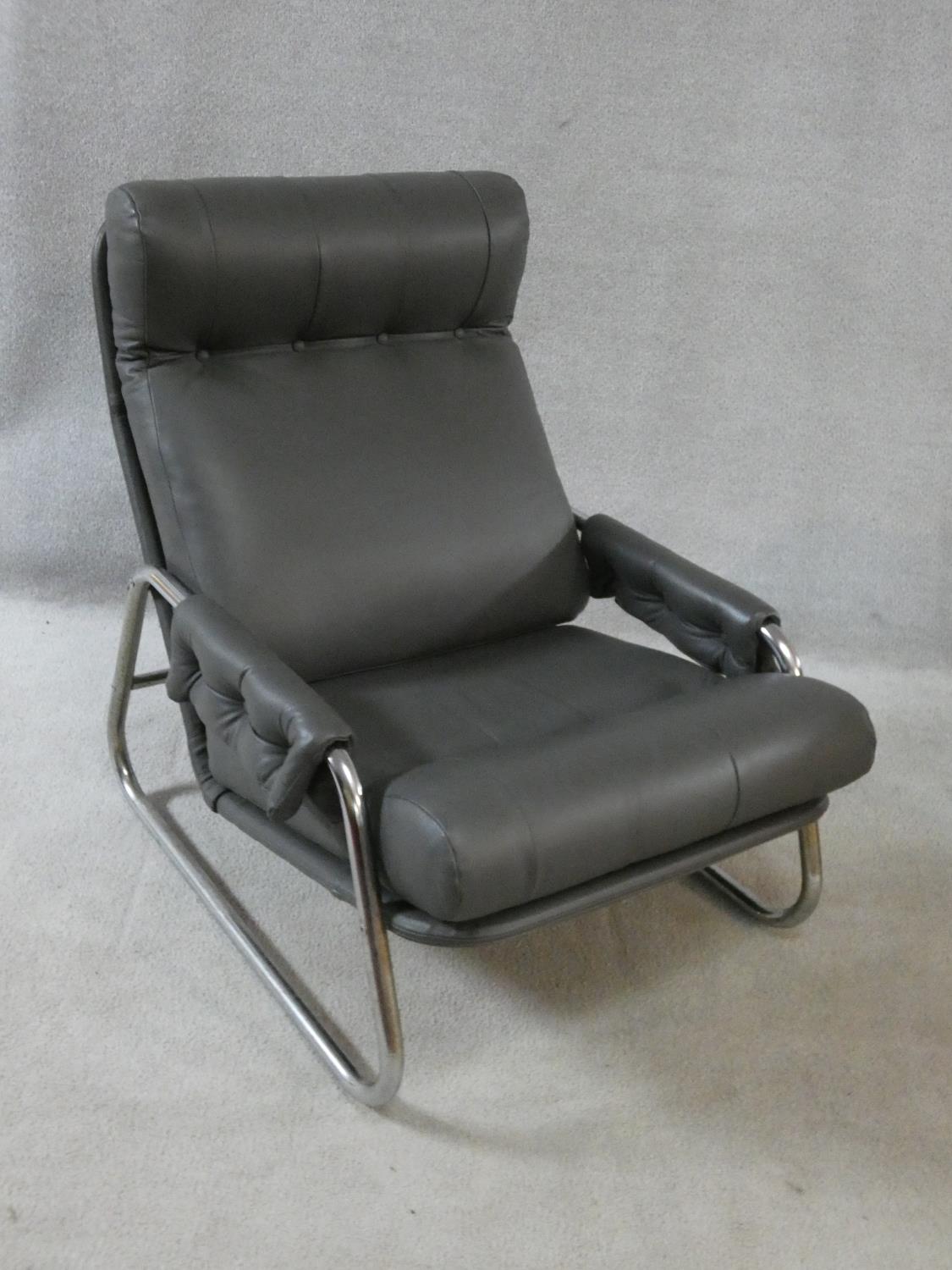 A vintage reclining armchair on chrome base in charcoal buttoned leather upholstery. H.82 W.65 D. - Image 2 of 9