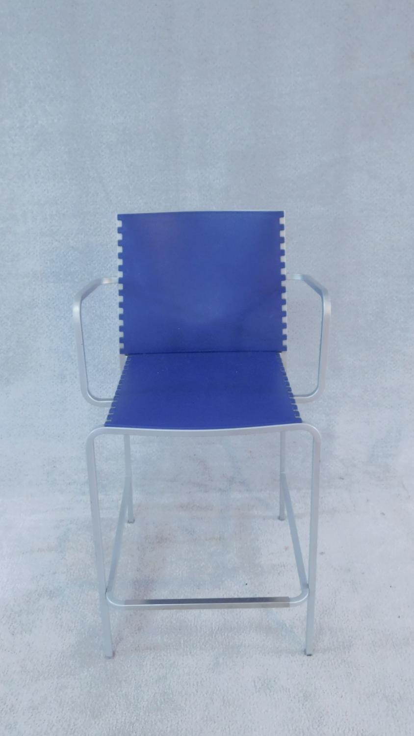 A pair of blue moulded Desalto 'Minotti' Zip high armchairs on tubular metal bases. H.94cm - Image 2 of 3