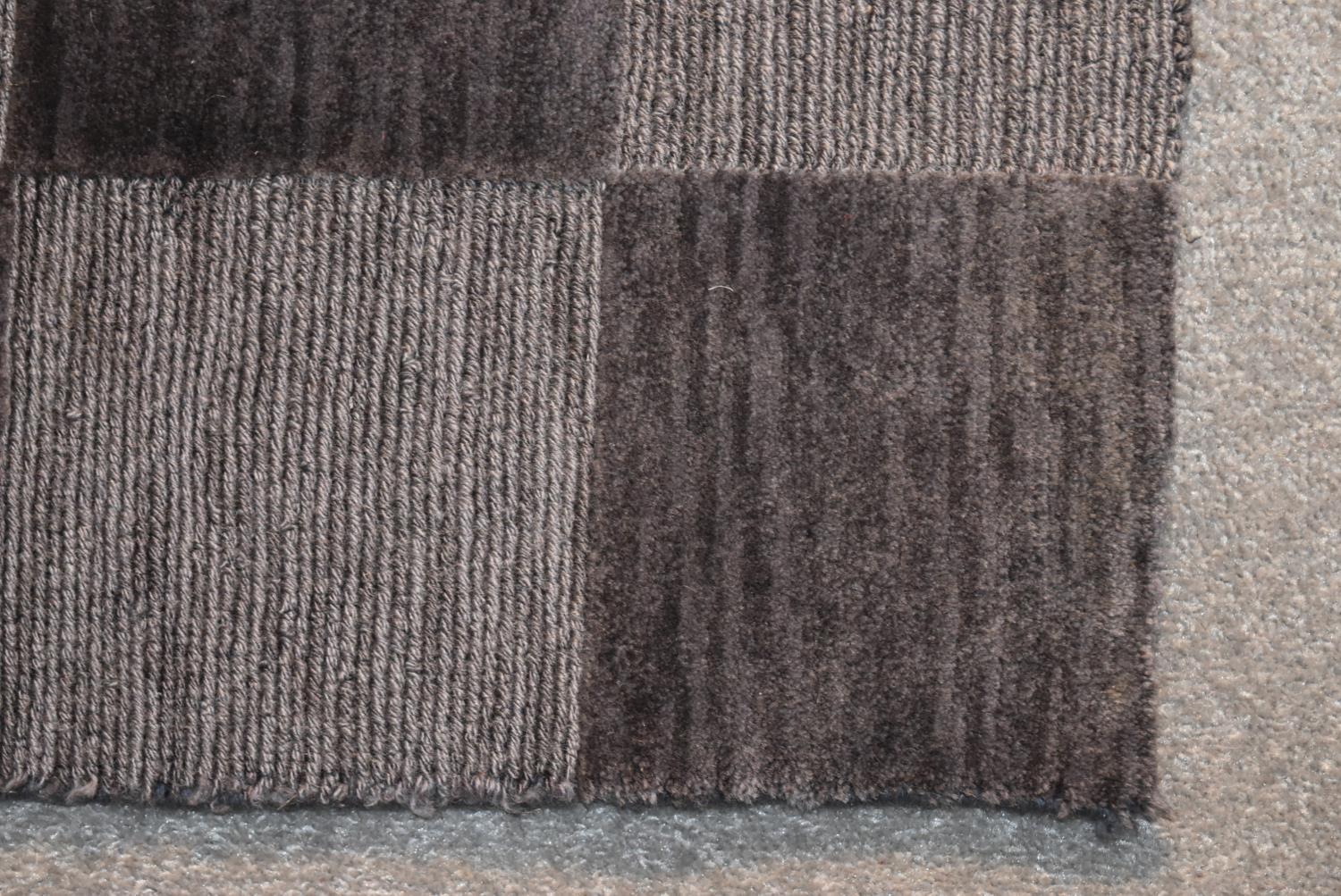 A contemporary rug with grey chequerboard pattern. L.144x94cm - Image 3 of 4