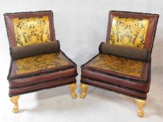 A pair of craftsman built salon chairs from the Pozzoli workshop upholstered in deep claret gilt