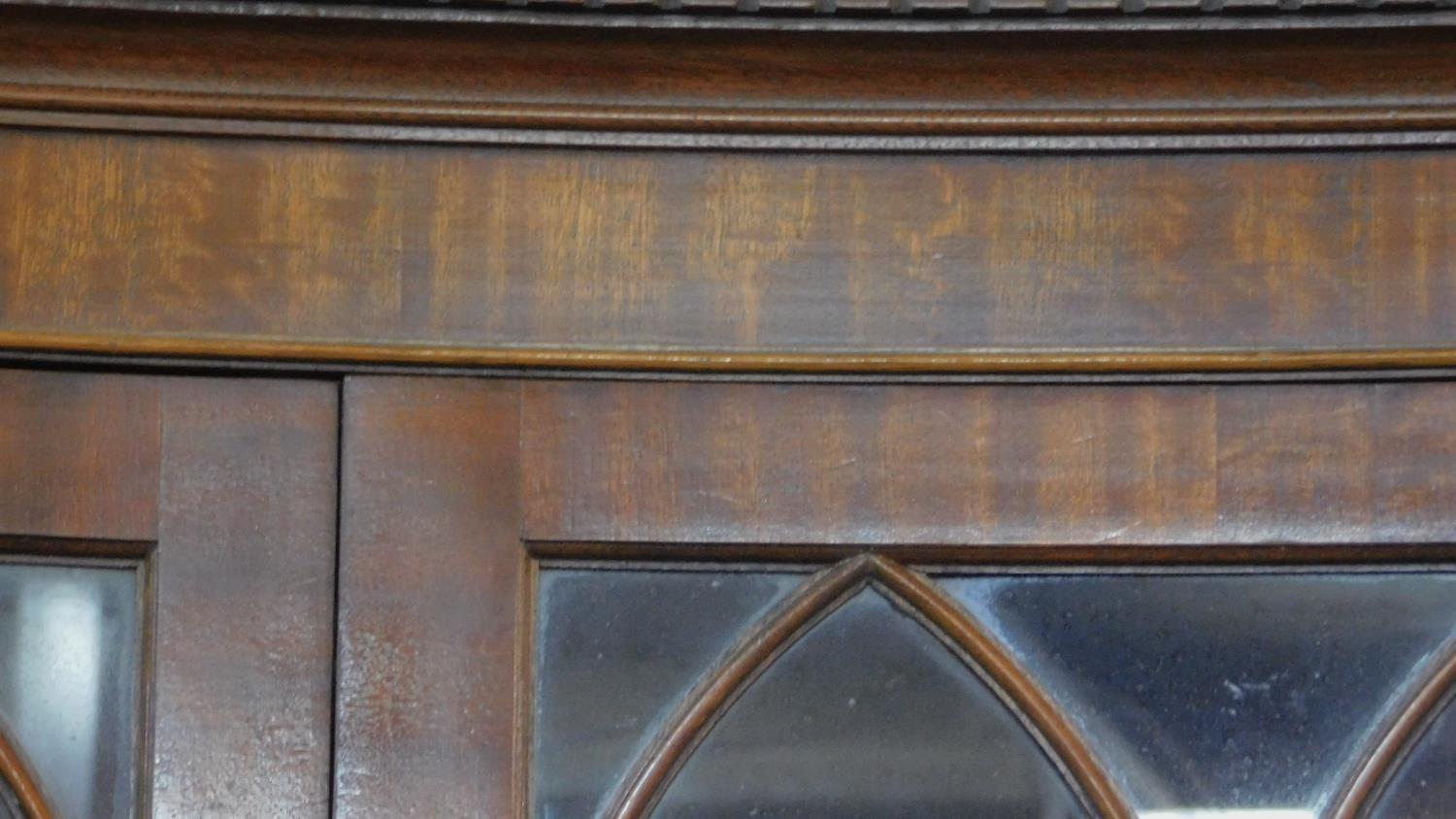 A Georgian style flame mahogany corner cupboard of concave outline with astragal glazed section - Image 4 of 7