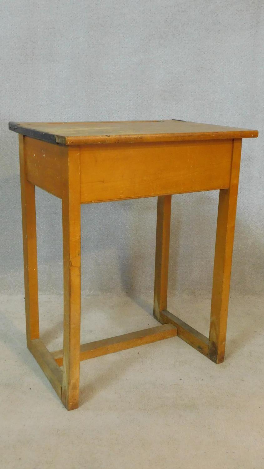 A vintage beech school desk with hinged lid revealing book compartment. H.80 W.62 D.42cm - Image 2 of 5