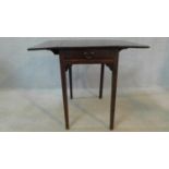 A Georgian mahogany Pembroke table fitted with frieze drawer on square supports. H.70 W.84 D.69cm