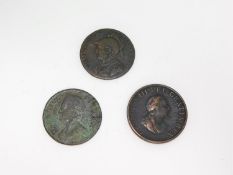 Three antique bronze coins. Including a George II halfpenny, 1751, a half penny token, 1794,