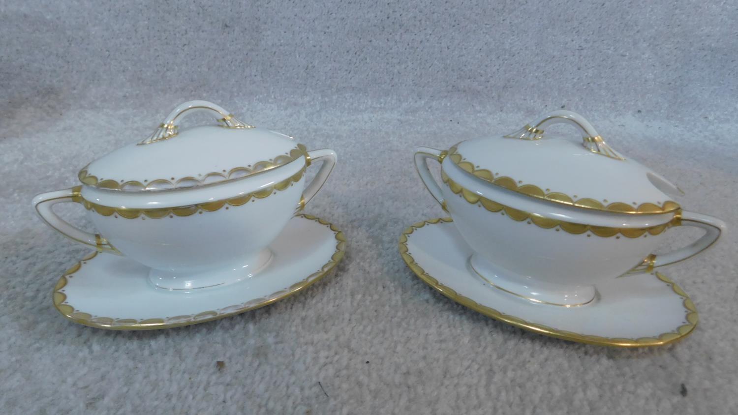 An extensive dinner service in white porcelain and gilt highlighted rims, marked Epiag, - Image 4 of 10