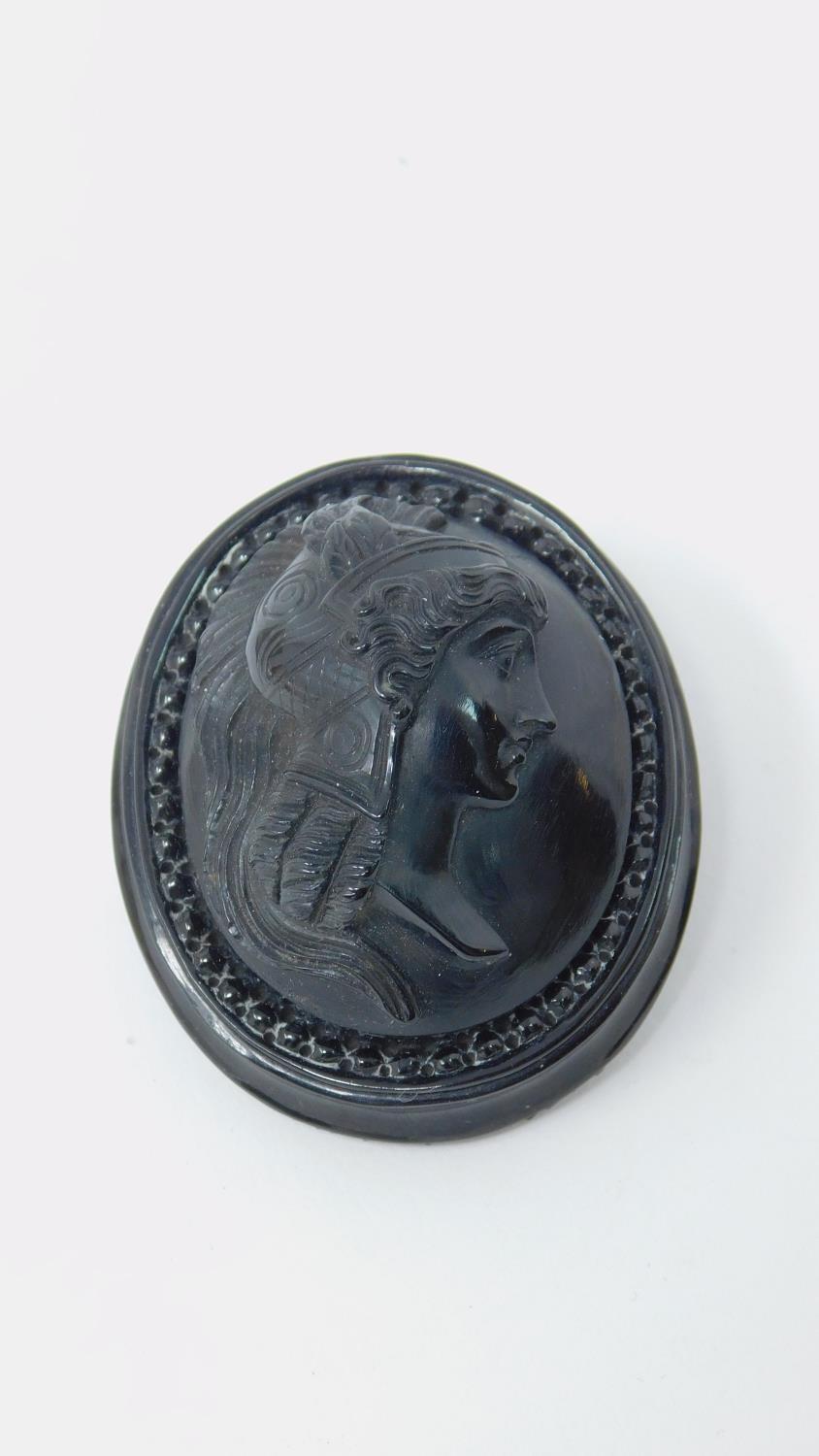 A collection of jewellery. Inlcuding a Victorian carved jet cameo brooch with the profile of a Greek - Image 2 of 7