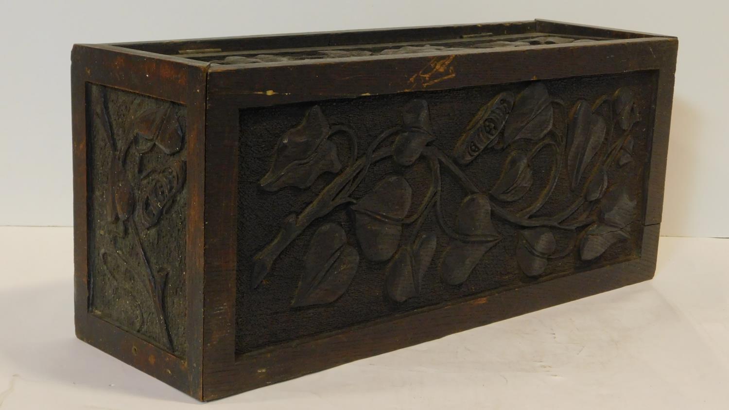 A late 19th century oak stationery casket with Arts and Crafts style floral carved panels. H.22 W.50 - Image 4 of 8