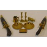A collection of antique and vintage brass items. Including a WW1 trench art hinged book lighter with