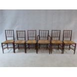 A set of six beech Sussex style chairs in the manner of Morris and Co. with spindle backs and