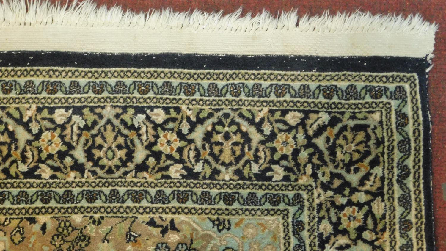 A silk Kashan rug with double medallions of scrolling flower and vine decoration on biscuit field - Image 3 of 4