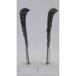 A pair of miniature Ahanti bronze swords with sculpted fish and scorpion motifs. Mounted on