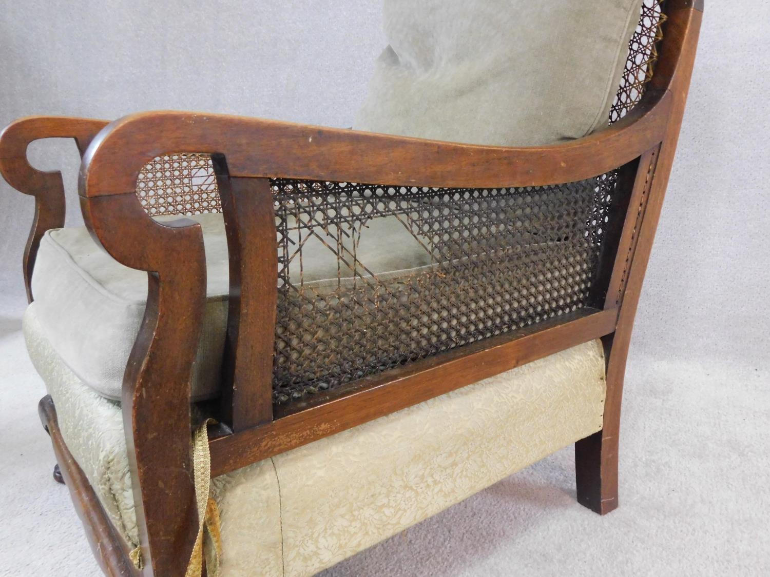 A mid century mahogany framed bergere armchair with squab cushions to seat and back. H.79 W.74 D. - Image 4 of 6