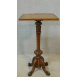 A 19th century carved rosewood chess table with burr maple inlaid chequerboard top on central column