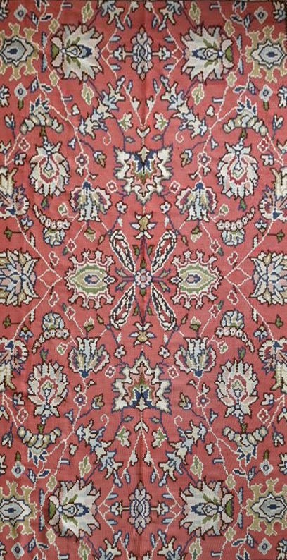 A Persian style flat weave carpet with scrolling leaves on madder ground within floral borders. L. - Image 2 of 4