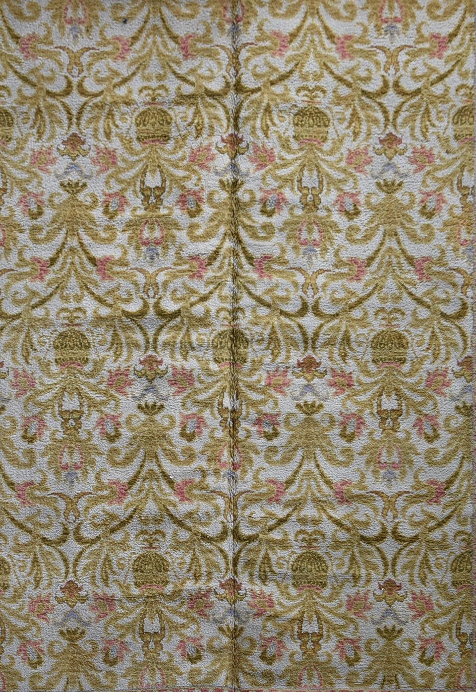 A vintage Spanish carpet with repeating scrolling floral design across the fawn field enclosed by - Image 2 of 5