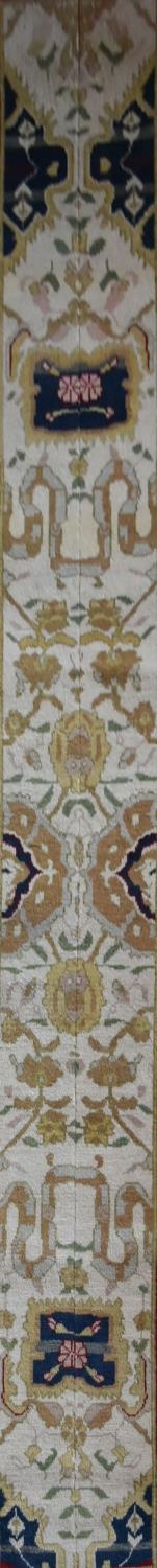 An Agra design runner with all over scrolling meandering stylised foliate decoration within floral - Image 2 of 5