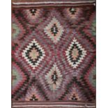 A Turkish Kilim with allover repeating diamond pattern. L.206xW.170cm