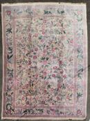 A William Morris design carpet in the Arts and Crafts manner with foliate and floral pattern