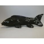 A naturalistically modelled Chinese bronze figure of a carp. L.59cm