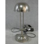 A vintage brushed metal adjustable desk lamp. H.47cm