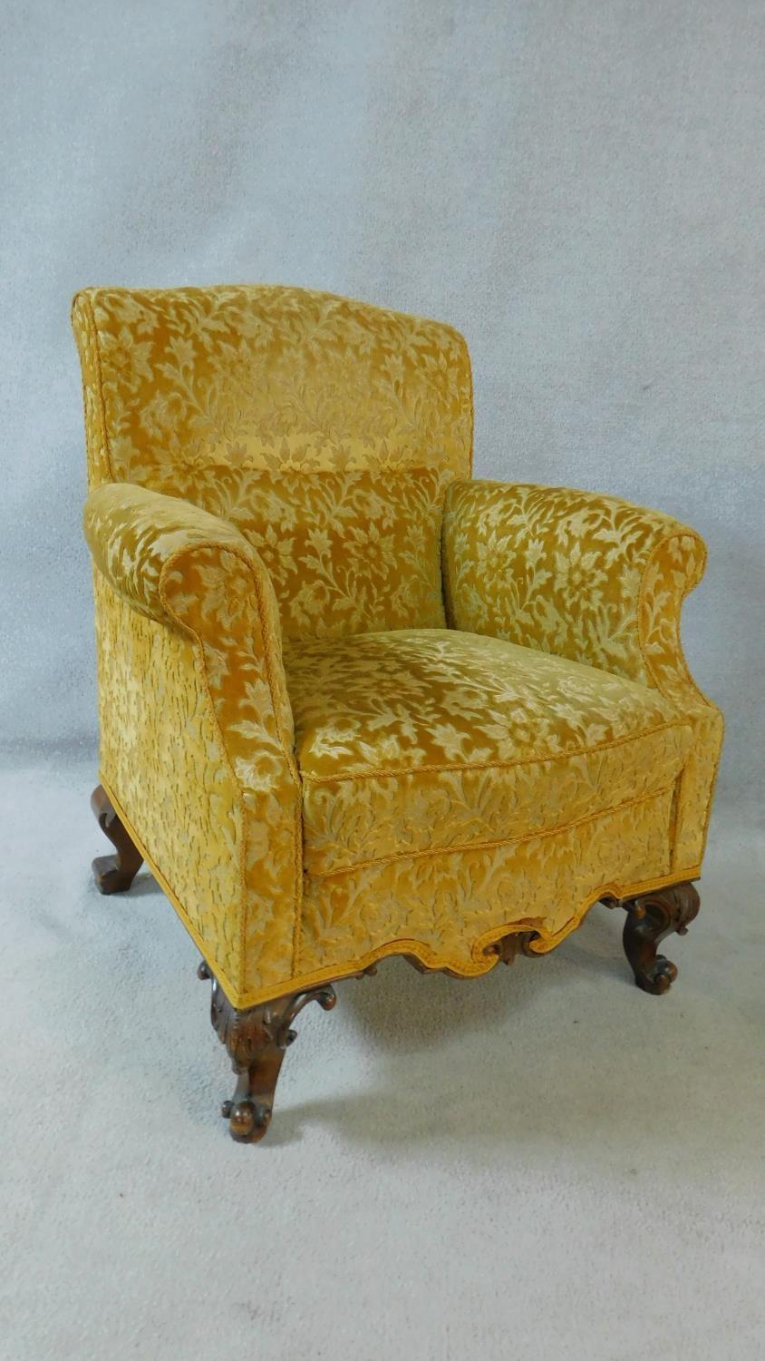 A pair of Georgian style armchairs in gold cut floral upholstery on walnut carved cabriole supports. - Image 3 of 10