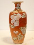 A Japanese Satsuma style baluster form vase with flared rim and handpainted floral and fan